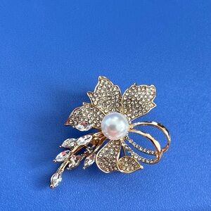 Elegant Gold and Silver Floral Brooch
